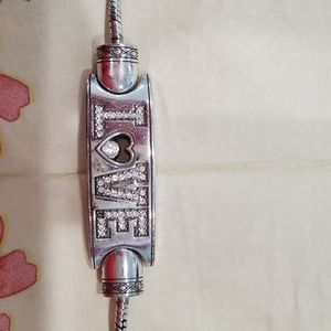 MEANINGFUL BRIGHTON ALL YOU NEED IS LOVE BREAST CA